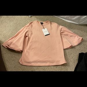 Baby pink shirt with fun fowy sleeves